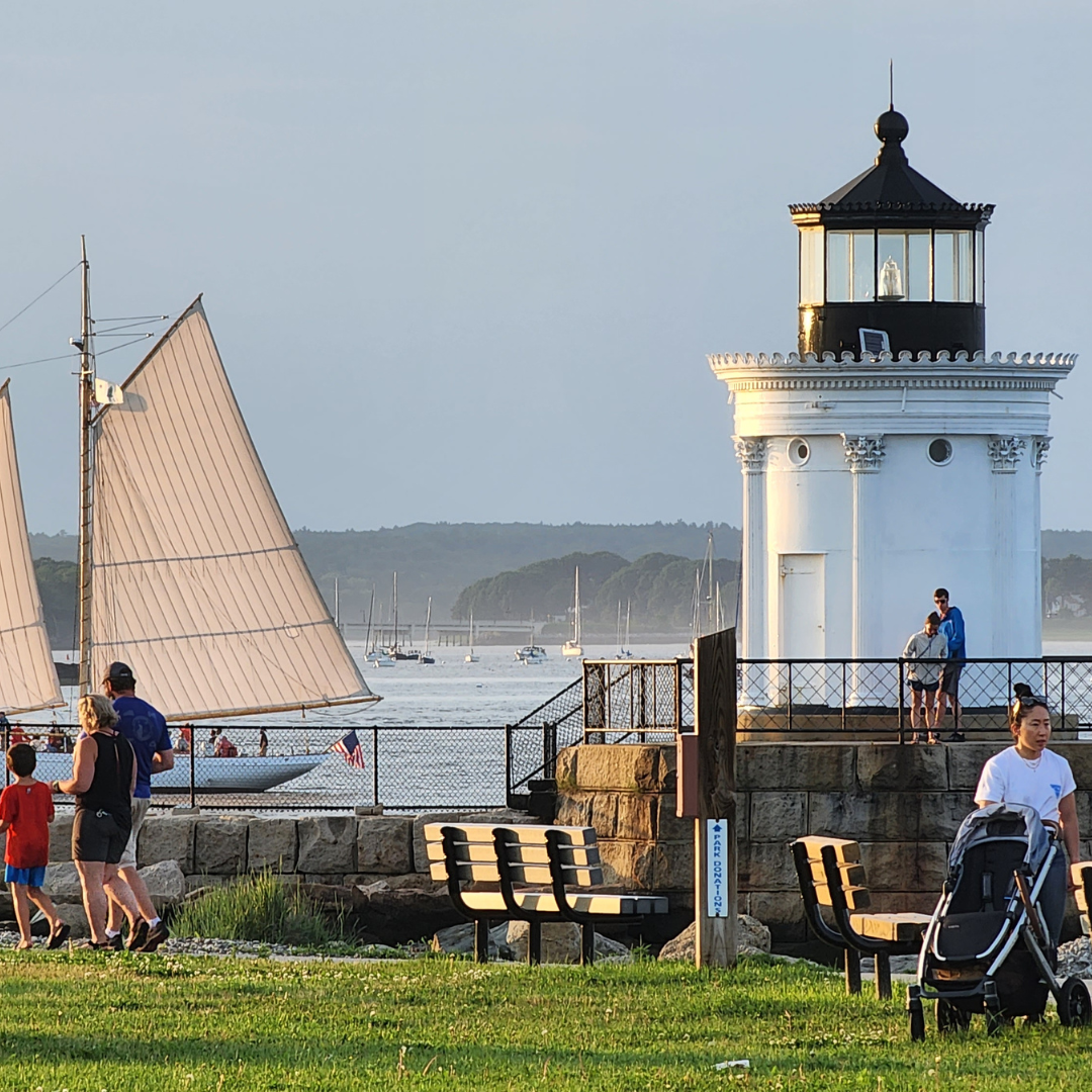 Bug light with sail boat and visitors